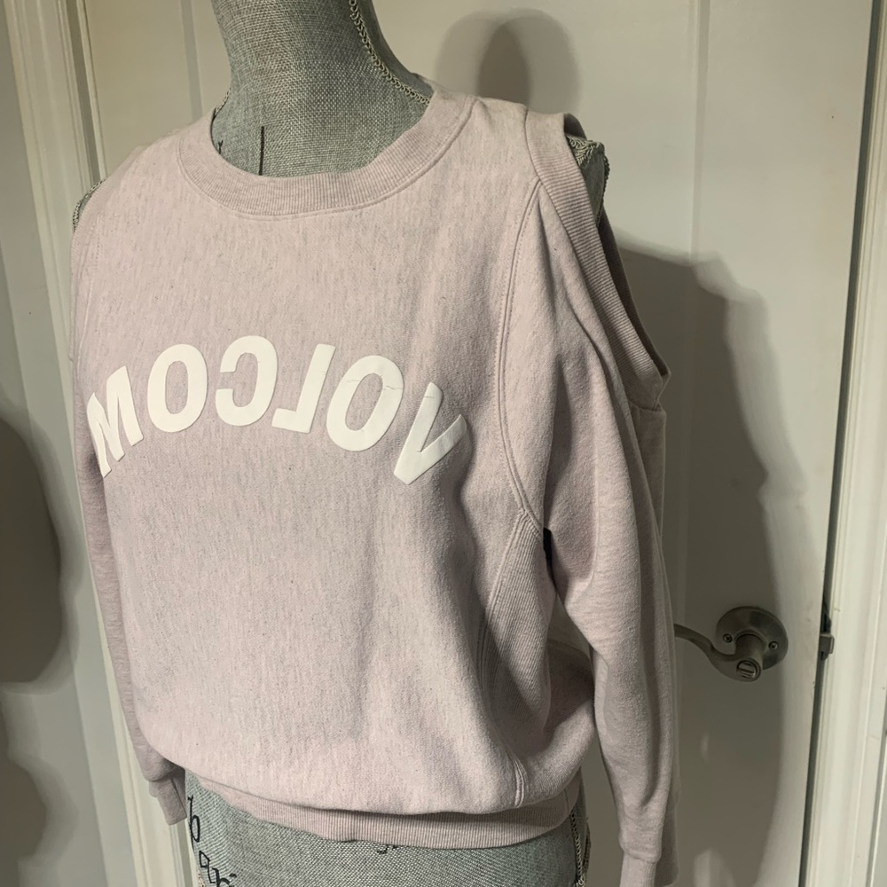 Volcom sweater with cutout shoulders. Like new